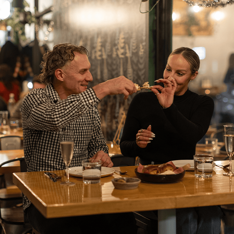 guests enjoying food at chef's table at vice & virtue brewing kelowna