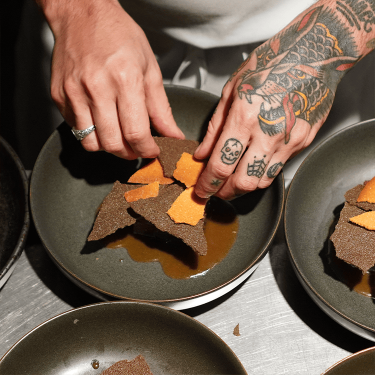 preparing dessert at vice & virtue brewing kelowna